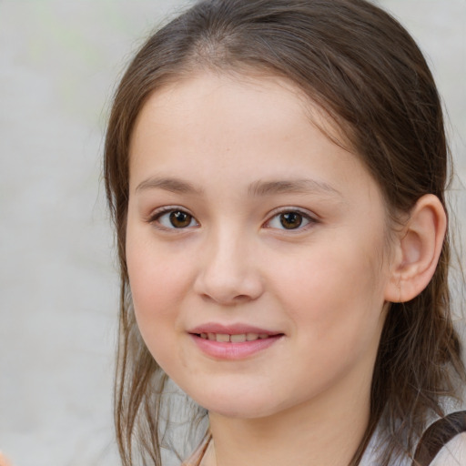 Joyful white child female with medium  brown hair and brown eyes