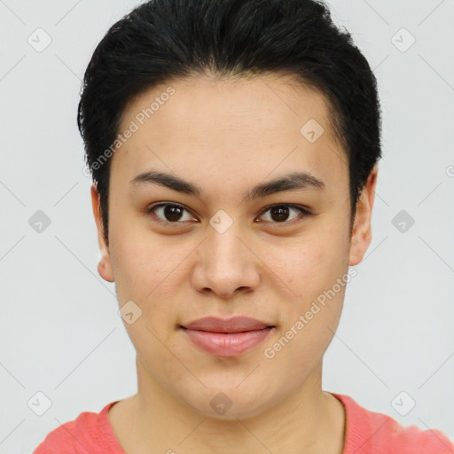 Joyful latino young-adult female with short  brown hair and brown eyes