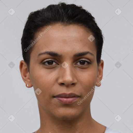 Joyful latino young-adult female with short  black hair and brown eyes