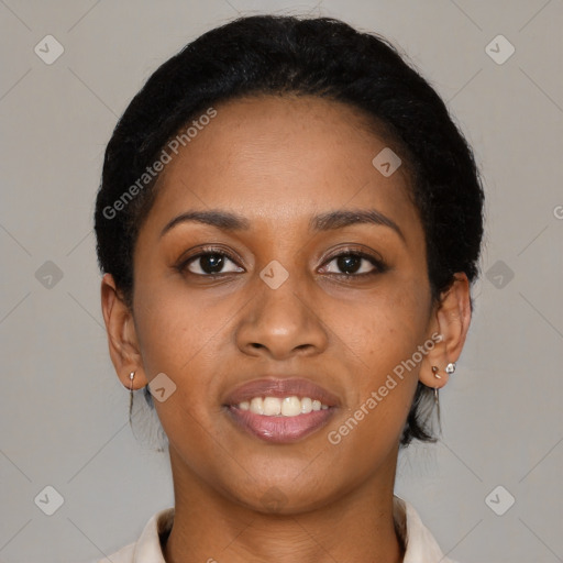Joyful black young-adult female with short  brown hair and brown eyes