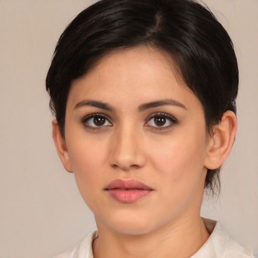 Neutral white young-adult female with medium  brown hair and brown eyes