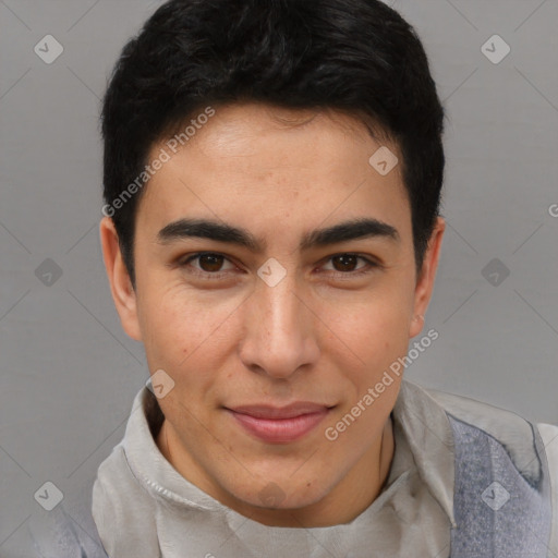 Joyful latino young-adult male with short  brown hair and brown eyes