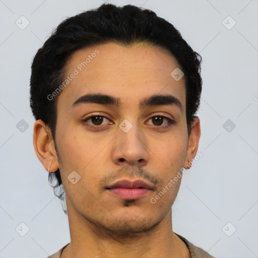 Neutral latino young-adult male with short  black hair and brown eyes