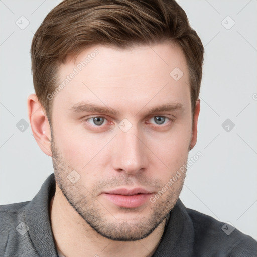 Neutral white young-adult male with short  brown hair and grey eyes