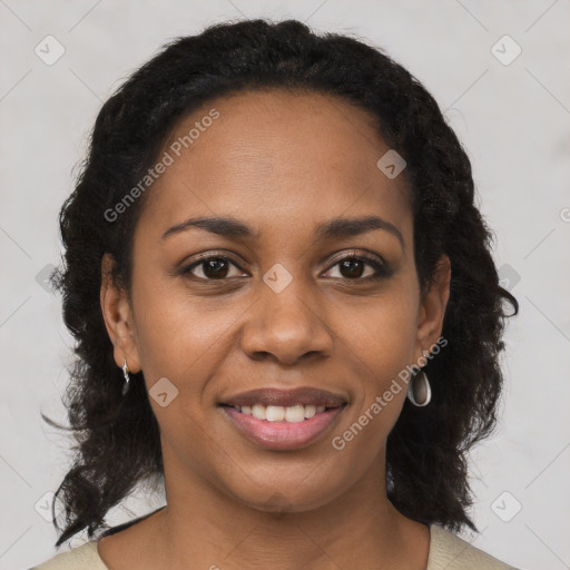 Joyful black young-adult female with medium  brown hair and brown eyes