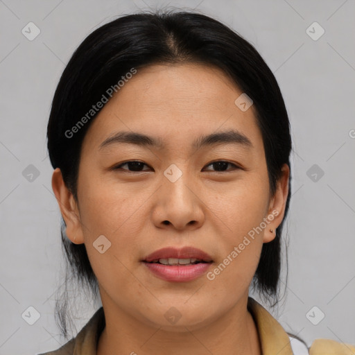 Joyful asian young-adult female with medium  brown hair and brown eyes