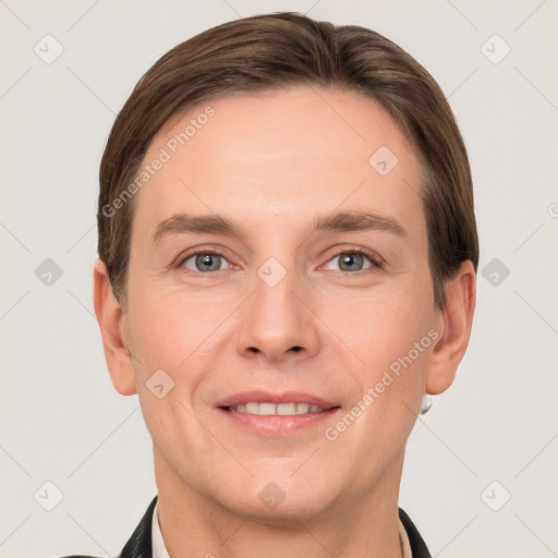 Joyful white adult male with short  brown hair and grey eyes