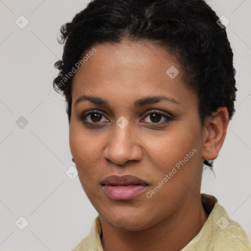 Joyful latino young-adult female with short  black hair and brown eyes