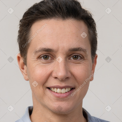 Joyful white adult female with short  brown hair and brown eyes