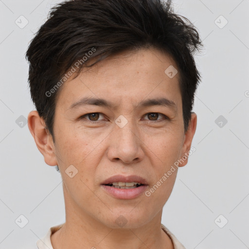 Joyful white adult male with short  brown hair and brown eyes