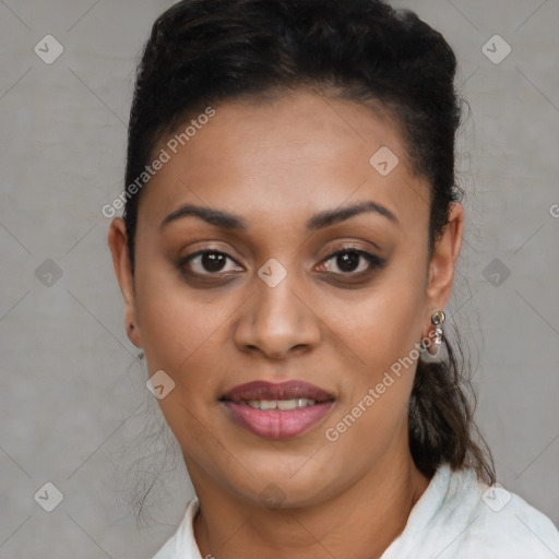 Joyful black young-adult female with short  brown hair and brown eyes