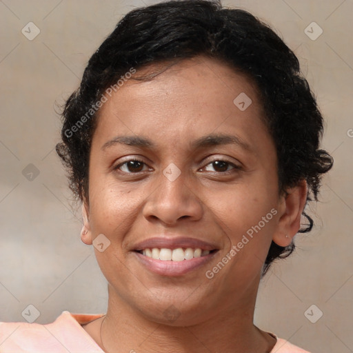 Joyful latino young-adult female with short  brown hair and brown eyes