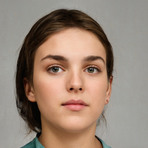 Neutral white young-adult female with medium  brown hair and brown eyes