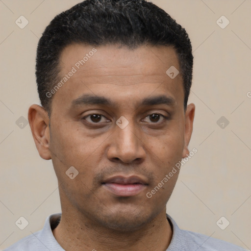 Neutral latino young-adult male with short  black hair and brown eyes