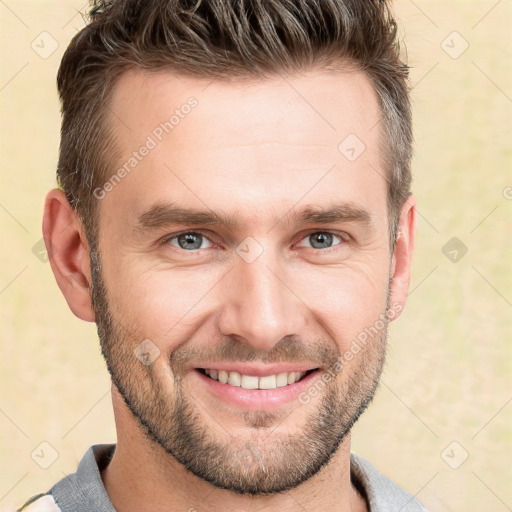 Joyful white adult male with short  brown hair and grey eyes