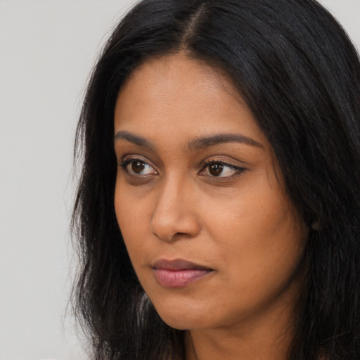 Neutral asian young-adult female with long  black hair and brown eyes