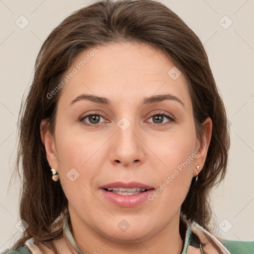 Joyful white young-adult female with medium  brown hair and brown eyes