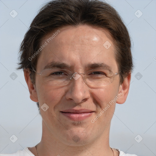 Joyful white adult male with short  brown hair and grey eyes