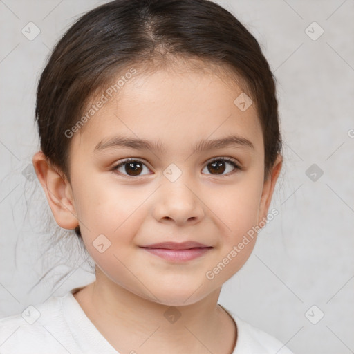 Joyful white child female with short  brown hair and brown eyes