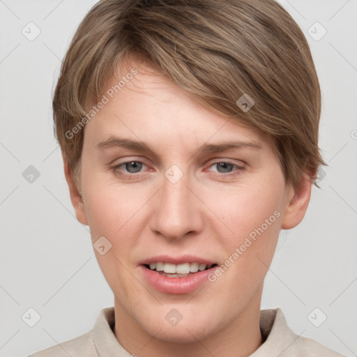 Joyful white young-adult female with short  brown hair and grey eyes