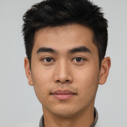 Neutral asian young-adult male with short  black hair and brown eyes