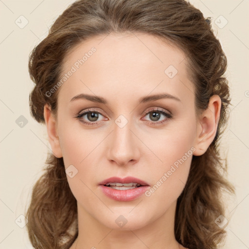 Joyful white young-adult female with long  brown hair and green eyes