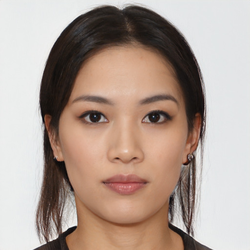 Neutral asian young-adult female with medium  black hair and brown eyes