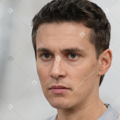 Neutral white adult male with short  brown hair and brown eyes