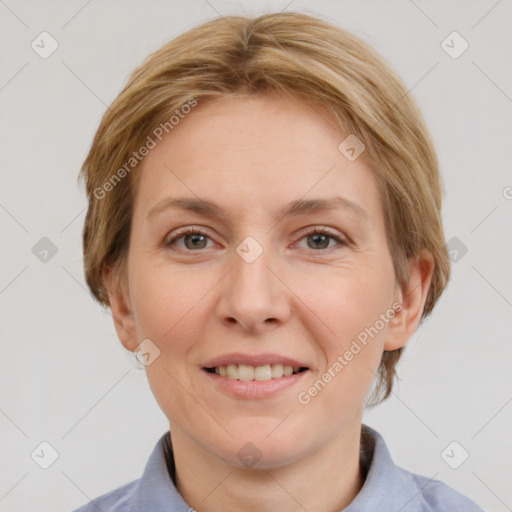 Joyful white adult female with short  brown hair and grey eyes