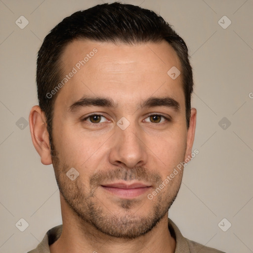 Joyful white young-adult male with short  brown hair and brown eyes