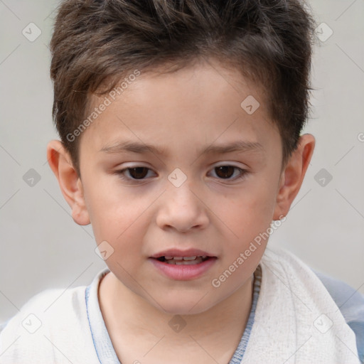 Joyful white child male with short  brown hair and brown eyes