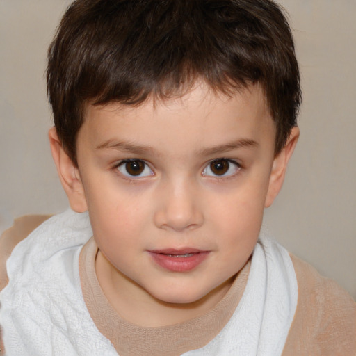 Joyful white child male with short  brown hair and brown eyes