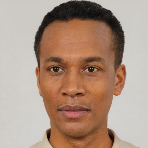 Neutral black adult male with short  black hair and brown eyes