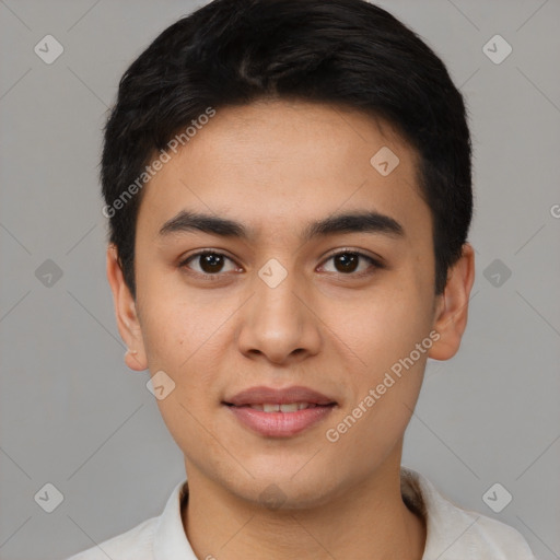 Joyful latino young-adult male with short  black hair and brown eyes