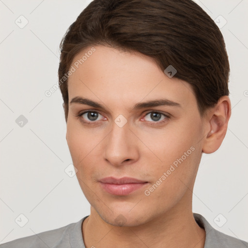 Joyful white young-adult female with short  brown hair and brown eyes