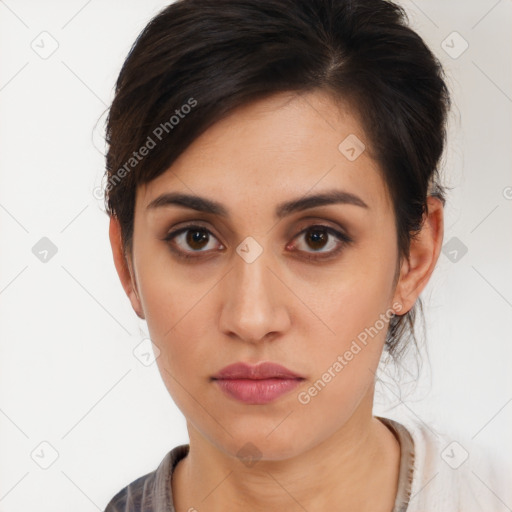 Neutral white young-adult female with short  brown hair and brown eyes