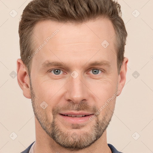 Joyful white adult male with short  brown hair and grey eyes