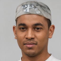 Neutral white young-adult male with short  black hair and brown eyes
