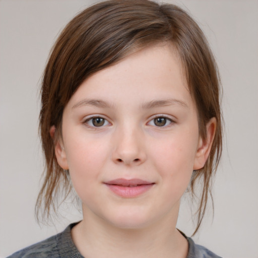 Joyful white child female with medium  brown hair and grey eyes