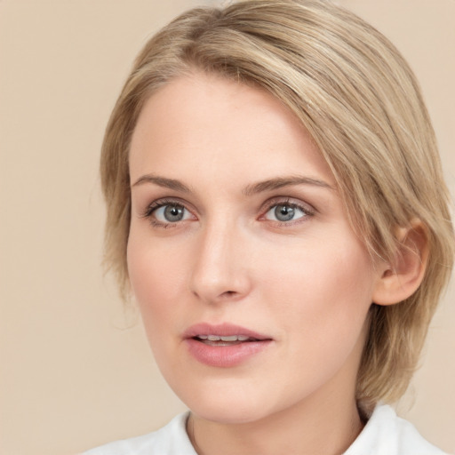 Joyful white young-adult female with medium  brown hair and blue eyes