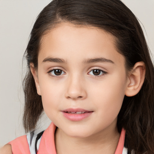 Joyful white child female with medium  brown hair and brown eyes