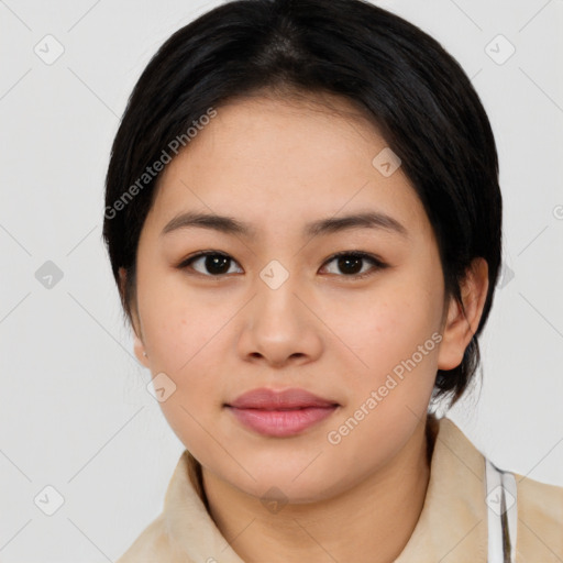 Joyful asian young-adult female with medium  black hair and brown eyes