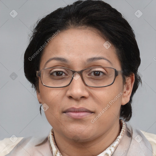 Joyful white adult female with medium  brown hair and brown eyes