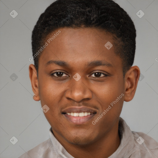 Joyful black young-adult male with short  brown hair and brown eyes