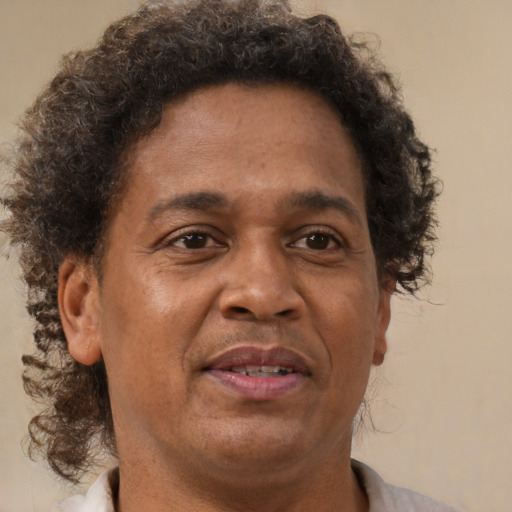 Neutral black adult male with short  brown hair and brown eyes
