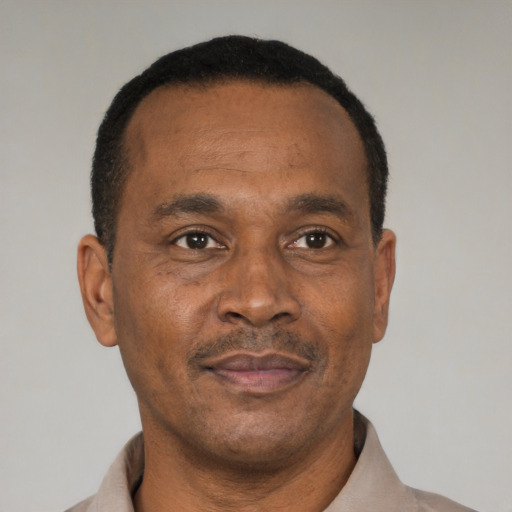 Neutral black adult male with short  black hair and brown eyes