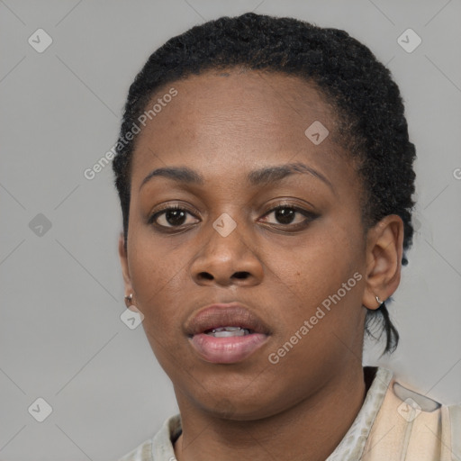 Neutral black young-adult female with short  black hair and brown eyes