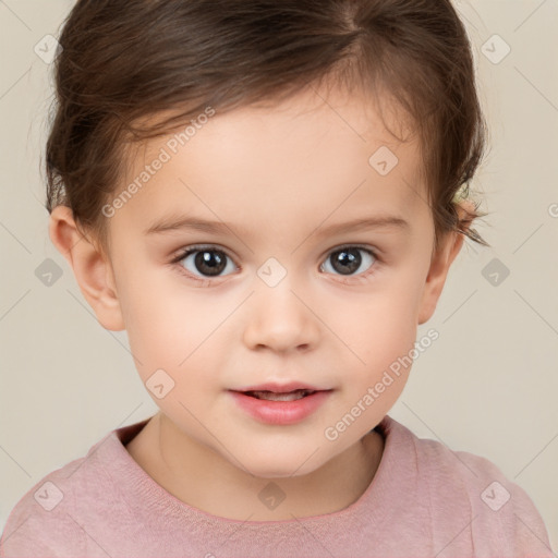 Joyful white child female with short  brown hair and brown eyes