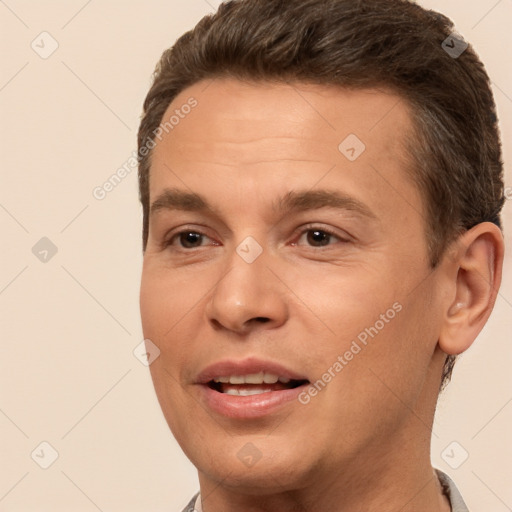 Joyful white young-adult male with short  brown hair and brown eyes