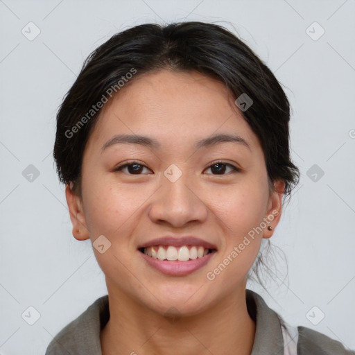 Joyful asian young-adult female with short  brown hair and brown eyes